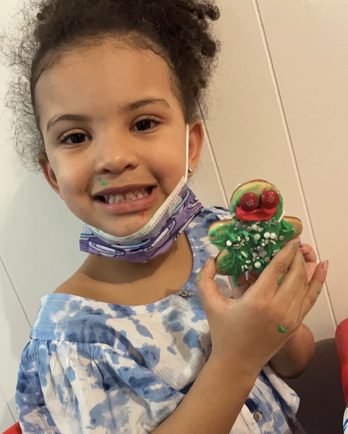 Celebrating with a decorated cookie at Happy Hearts
